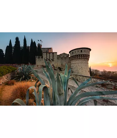 View of Brescia Castle at sunset