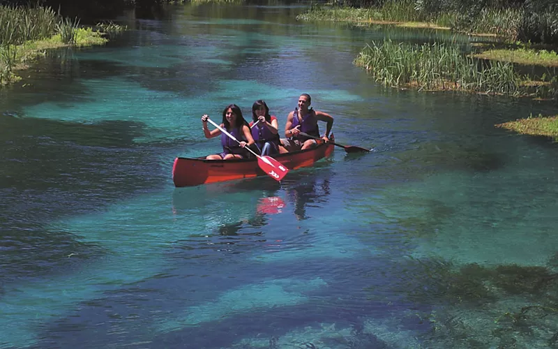 Paddling the crystal-clear waters of the River Tirino