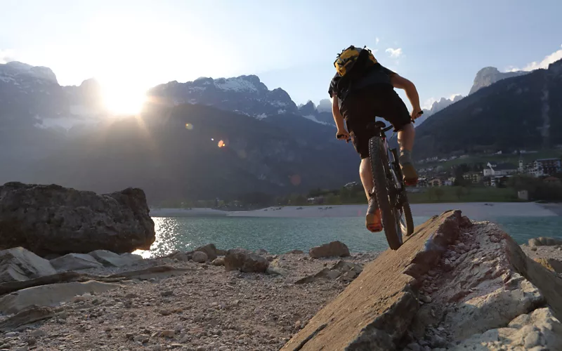 Mountain biking close to luminescent bodies of water