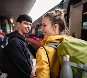 How to travel by bus or train with friends in an eco-friendly and fun way