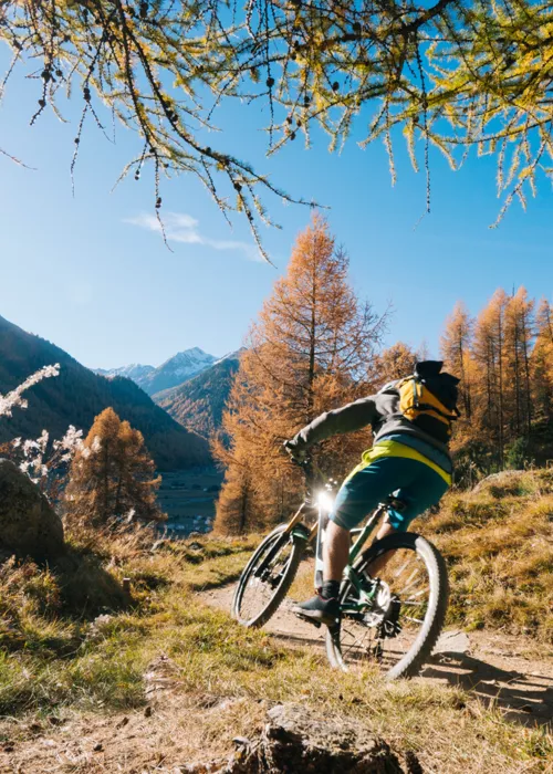Cyclist on a mountain path in Italy
