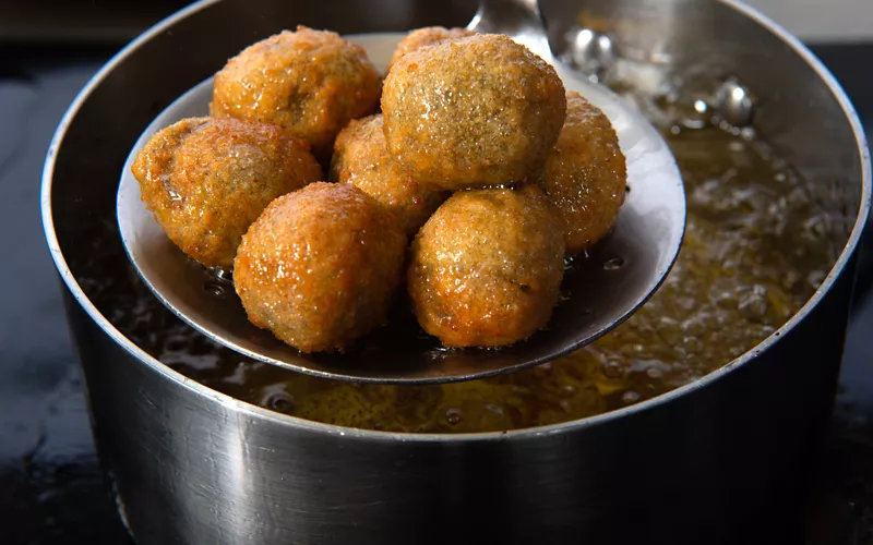 Preparing Ascolana olives