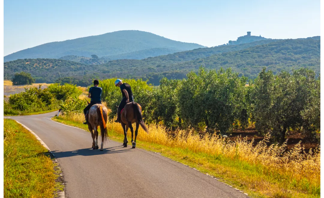 Horse riding in the countryside in Italy
