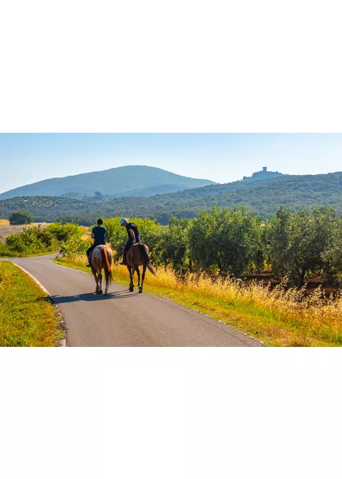 Horse riding in the countryside in Italy