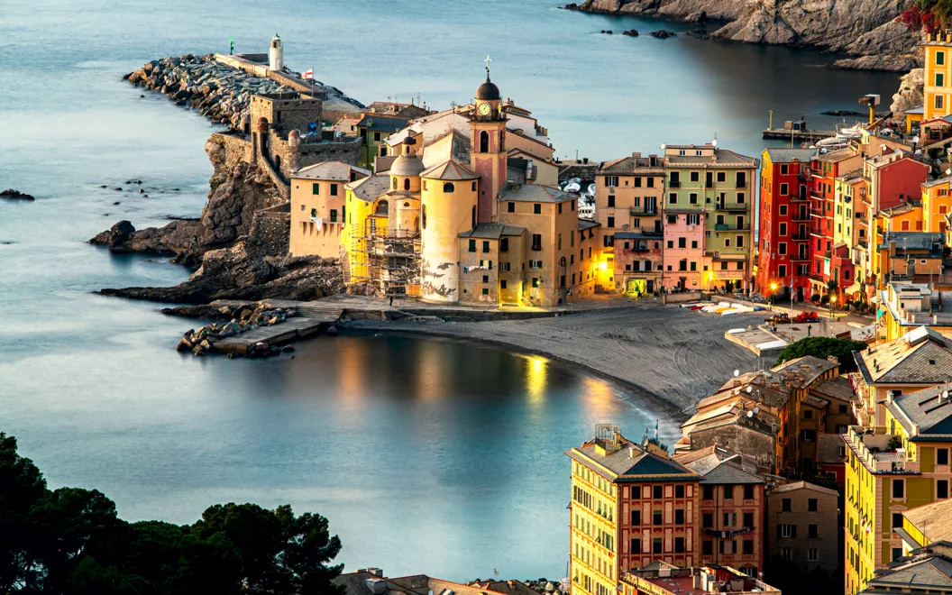 View of Camogli lit up at dusk