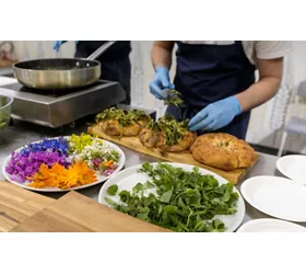 Preparing a typical dish in a restaurant