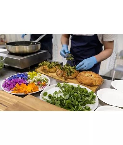 Preparing a typical dish in a restaurant