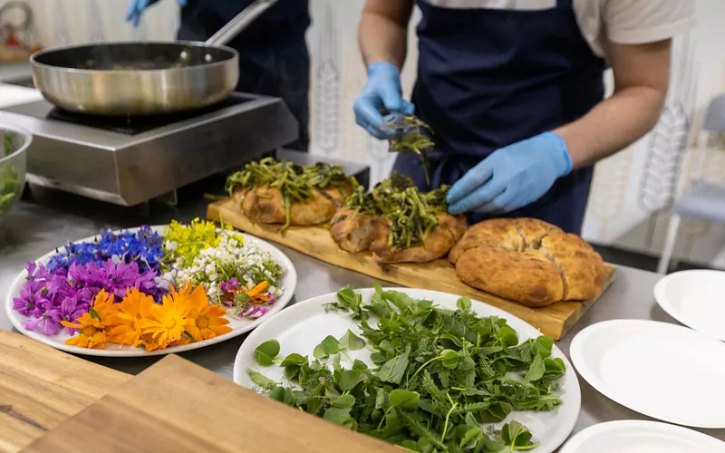 Preparing a typical dish in a restaurant