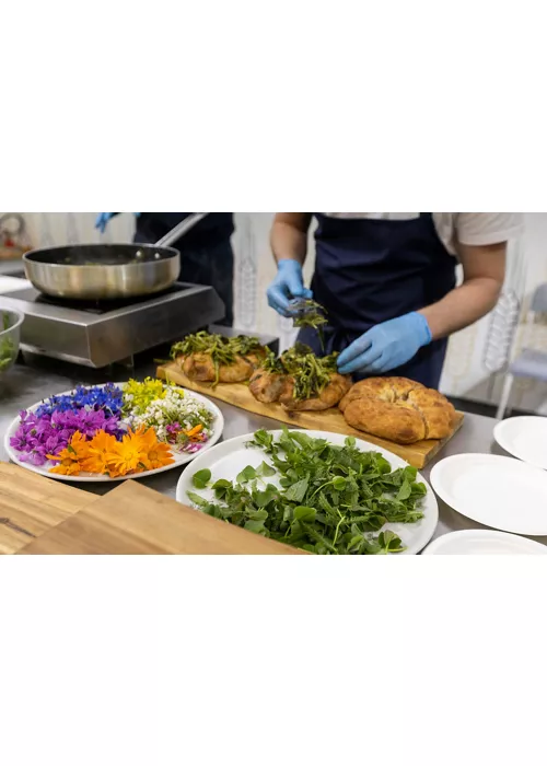 Preparing a typical dish in a restaurant