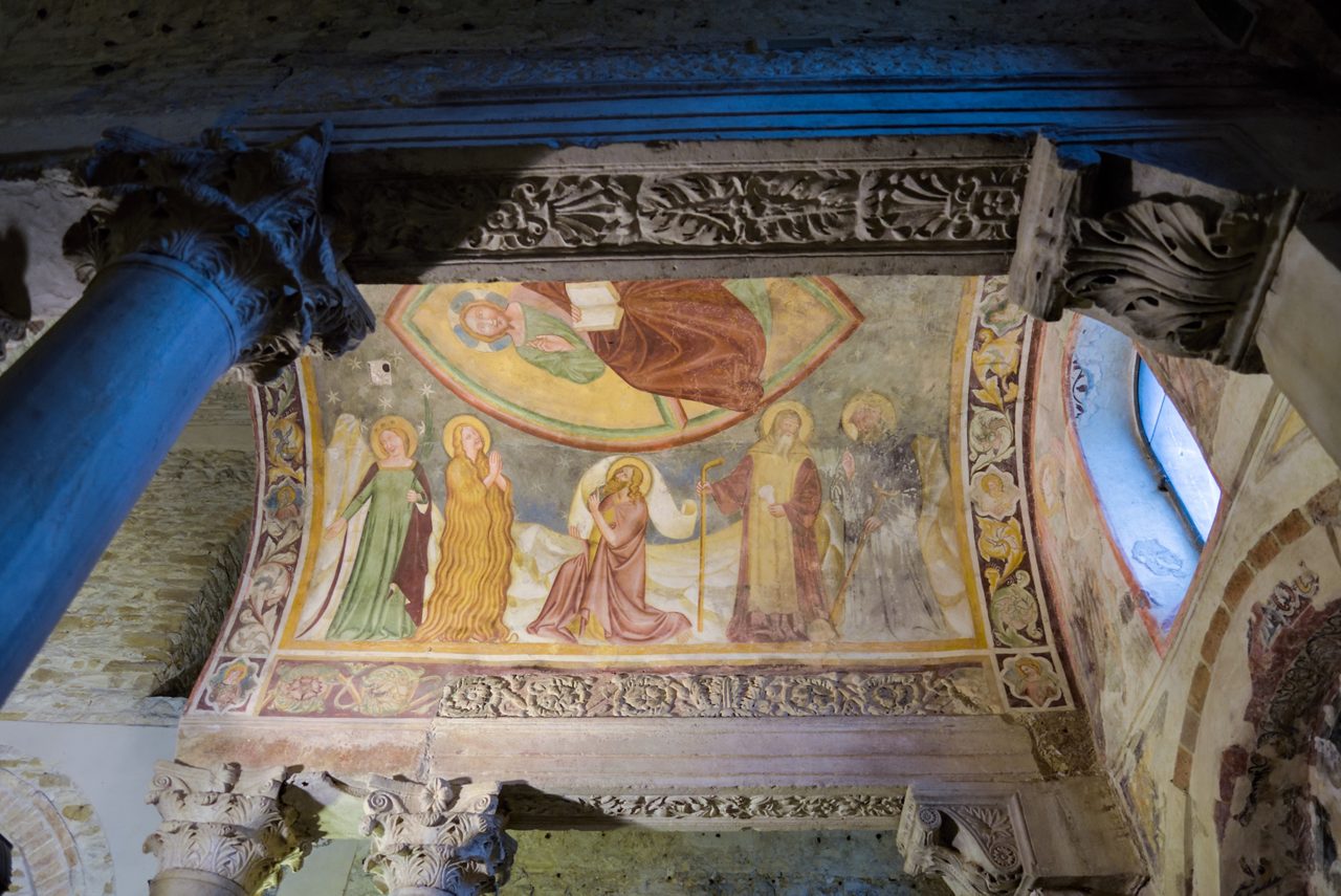 Cividale, Friuli Venezia Giulia, Italy - 09 14 2019 : Interior detail of "Tempietto Longobardo / Longobard Temple" colorful paintings / fresco - Unesco world heritage. Built around 760 d.c