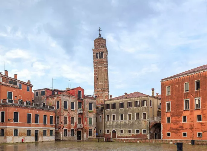 The leaning skyline of Venice and its bell towers.