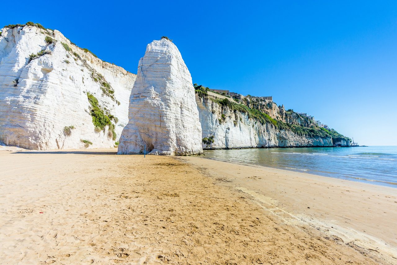 Beach of Pizzomunno rock, at Vieste, in Apulia region, South  Italy