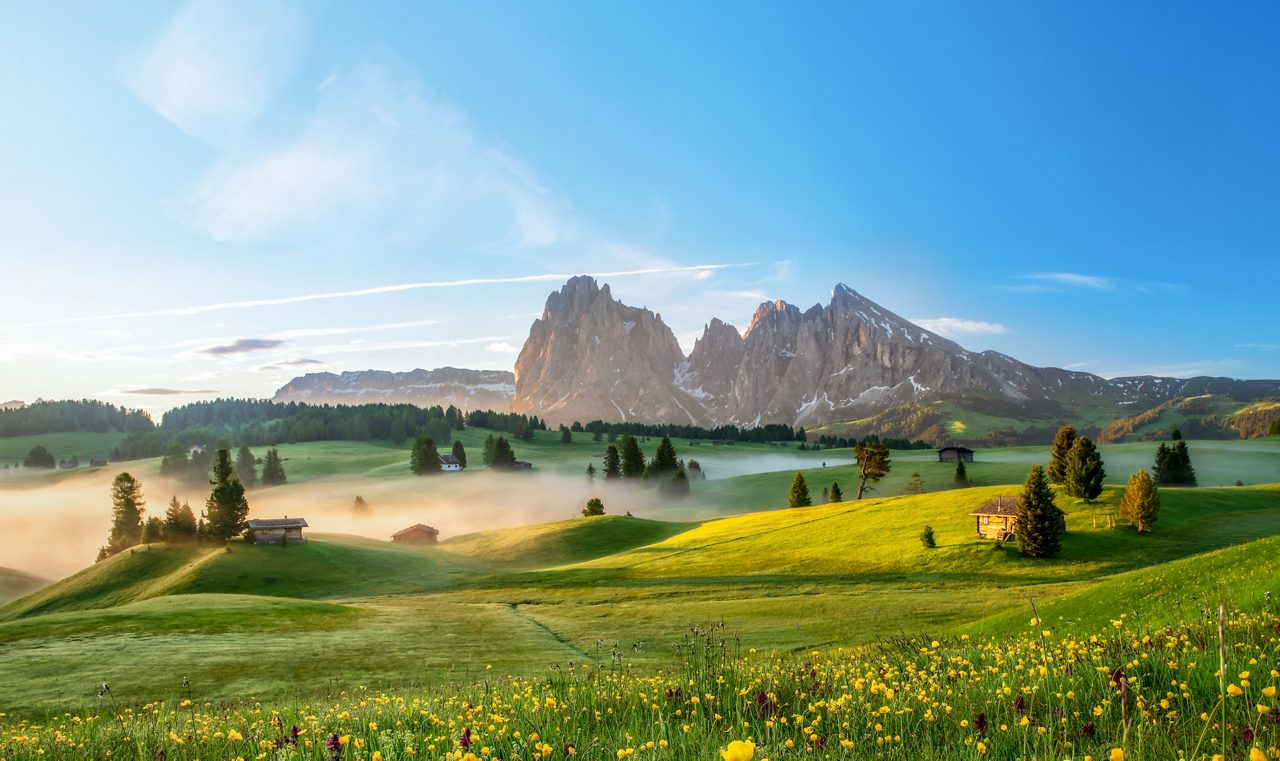 Spring on Alpe di Siusi with a view to Langkofel group
