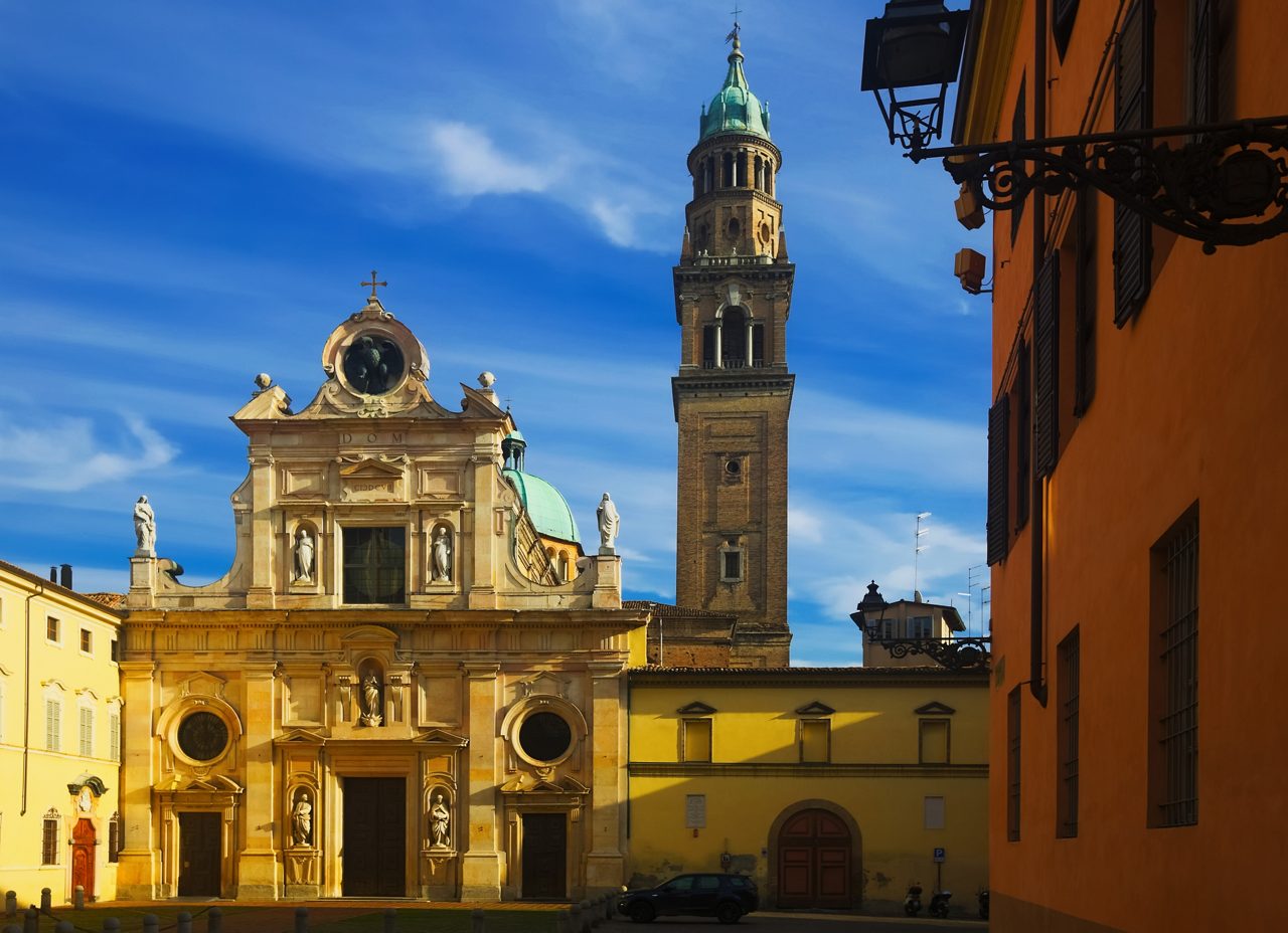 View of bell tower and facade of San Giovanni Evangelista church, Parma, Italy