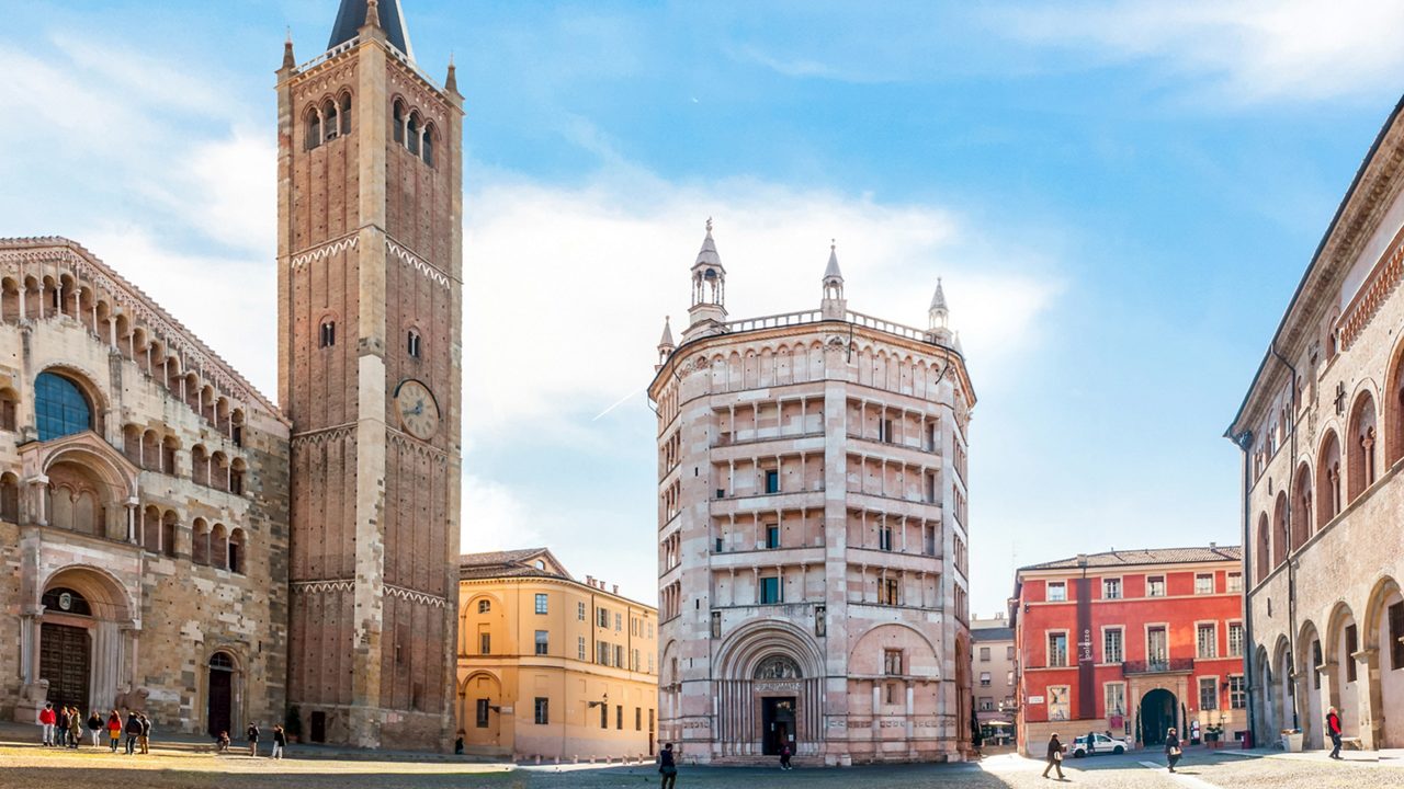 PARMA, ITALY, NOVEMBER 17, 2017: Panorama of Piazza Duomo with Cathedral, tower bell and Baptistery. Parma is famous for food ham and music. Parma will be italian capital of culture in 2020.