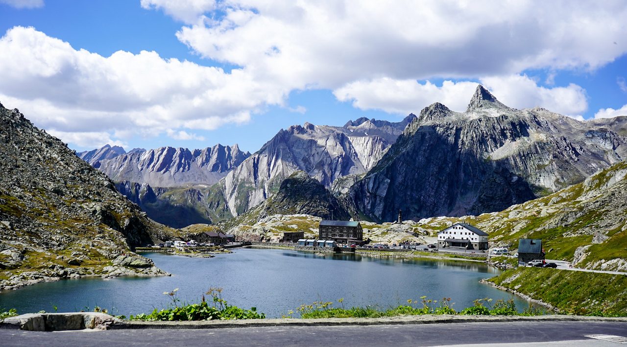 Colle del Gran San Bernardo, Italy - 09/05/2018: panoramic view of the mountain, lake and border with Switzerland