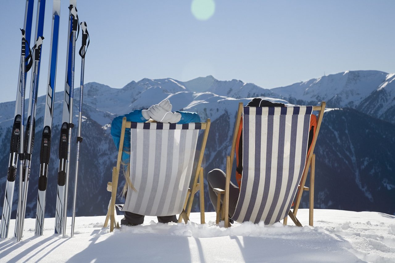 Couple in deck chairs, Luesener Alm, Dolomite Alps, South Tyrol, Italy