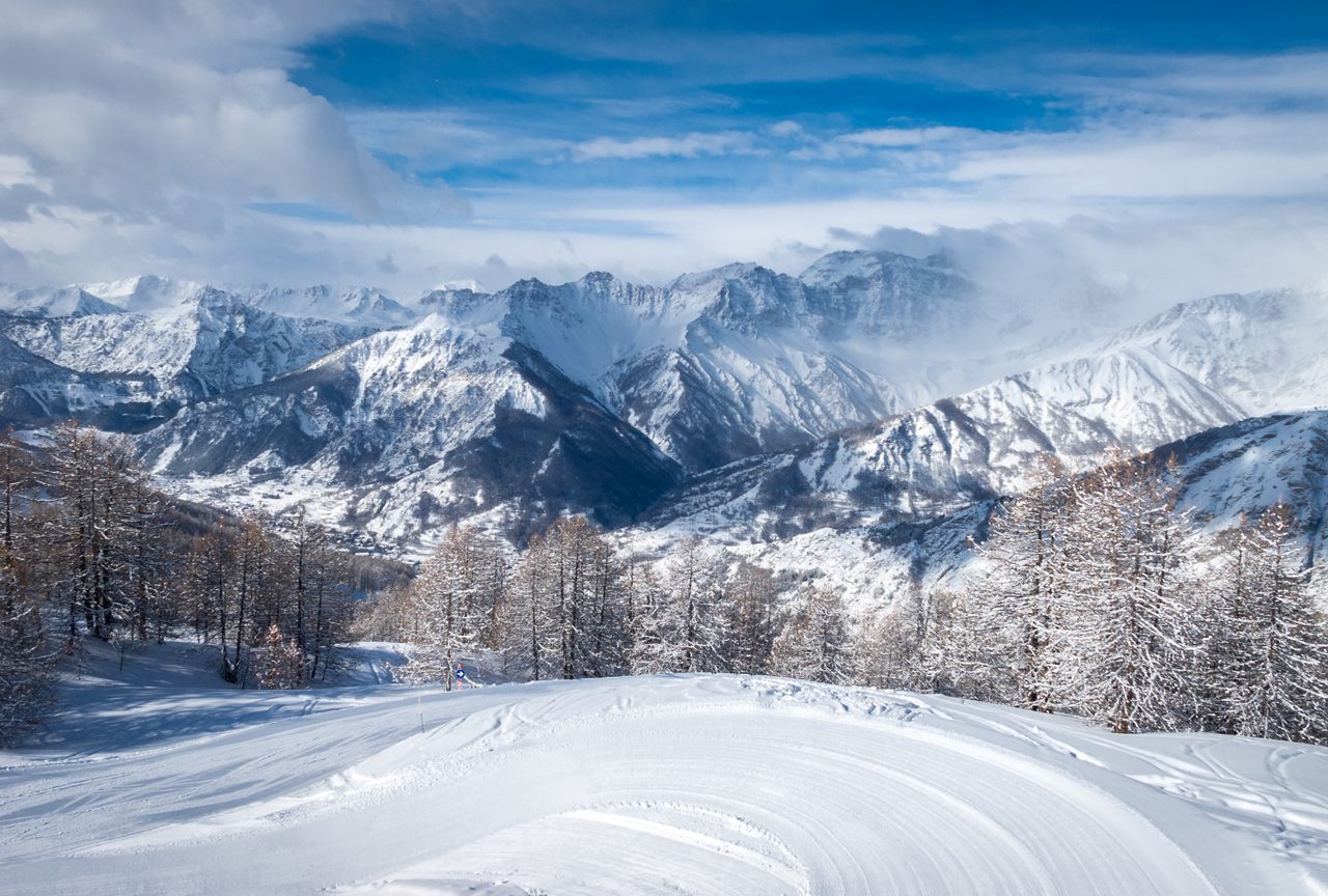 Beautiful scenic view of Bardonecchia, Piedmont, Italy, Italian Alps, covered in fresh snow after a snowfall against a crystal clear blue sky, snowy slopes, winter landscape. Photos with Snow