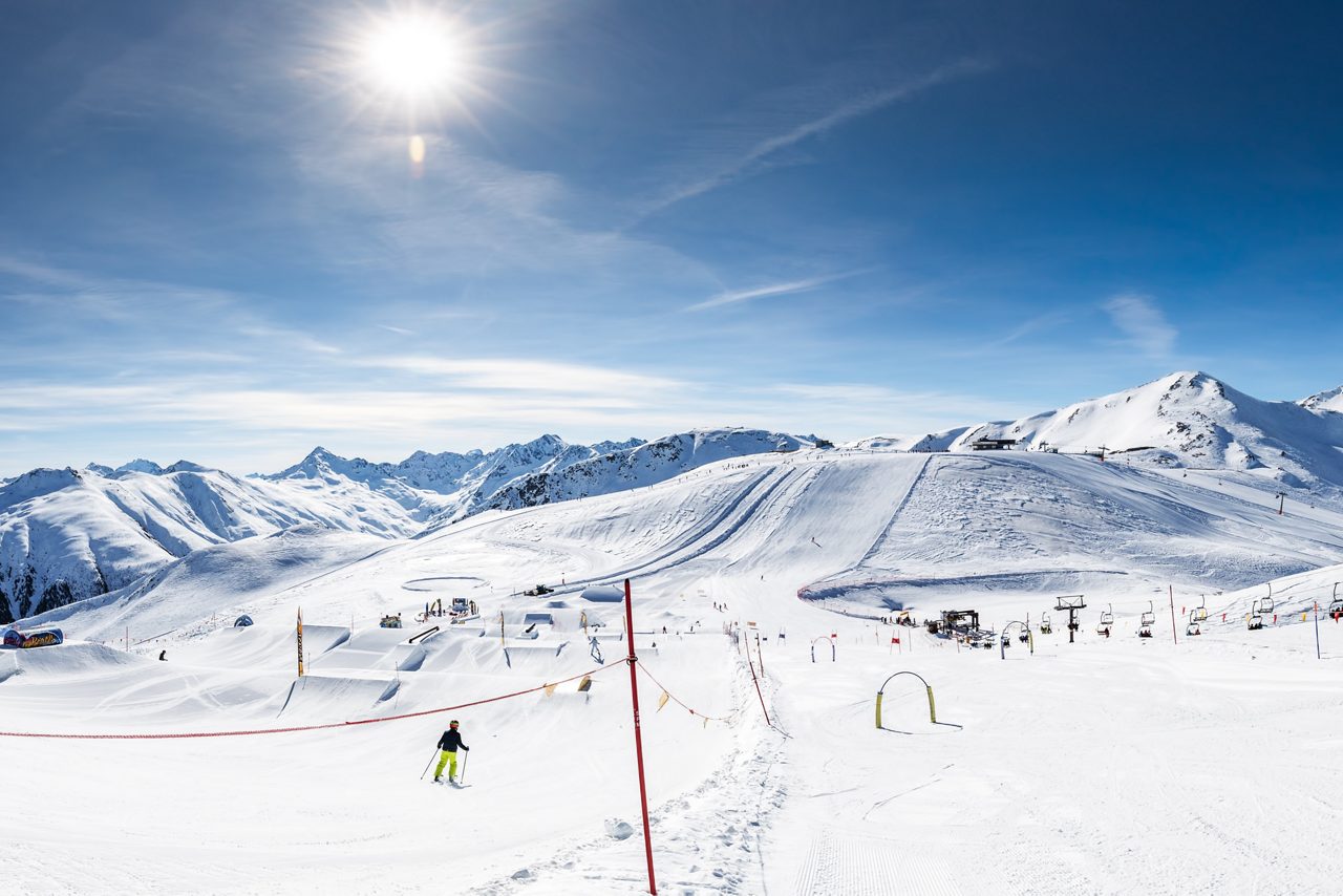 LIVIGNO, ITALY - Feb. 2019 - Skiers skiing in Livigno ski resort, Livigno, Italy, Europe.