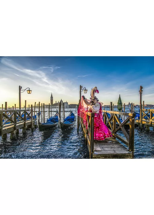 Venice Carnival mask on the canal