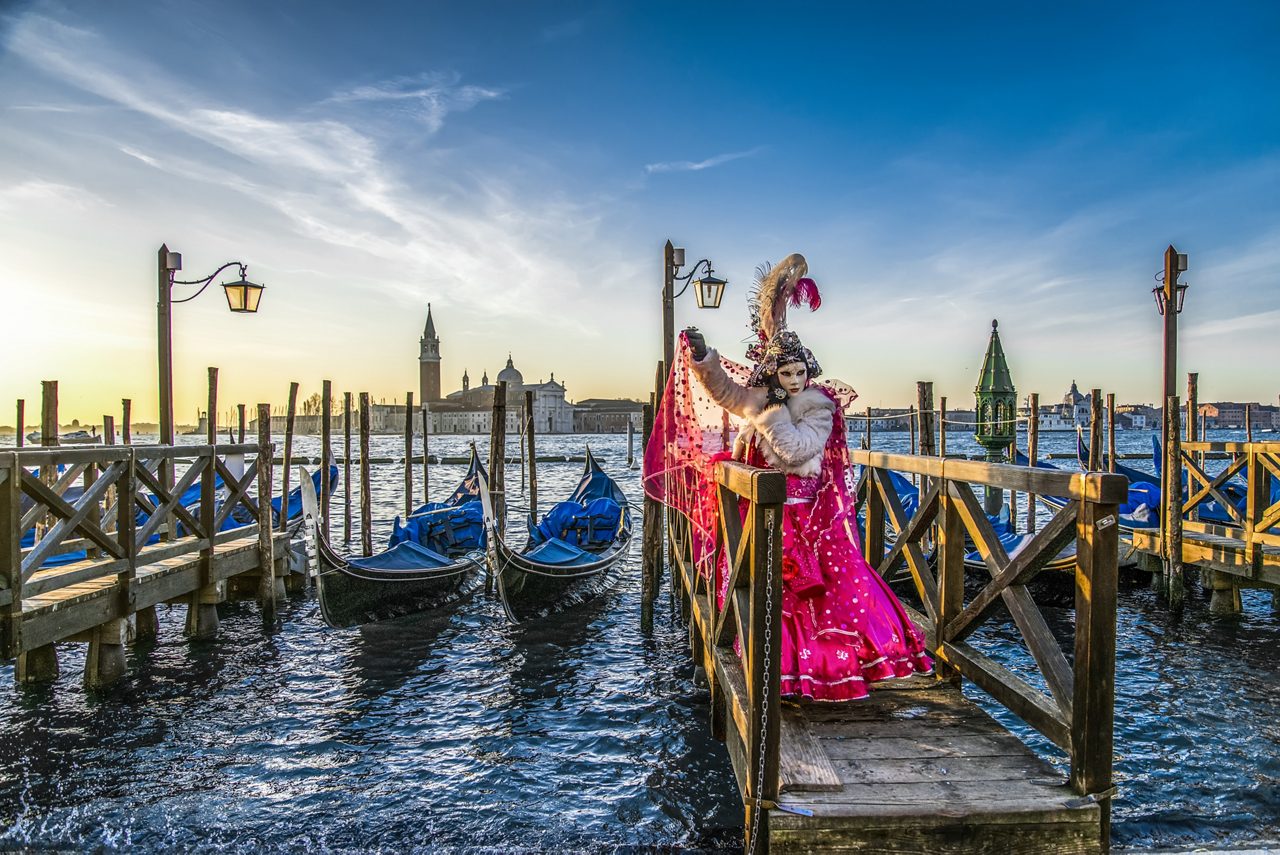 woman in mask and costume at the carnival in Venice