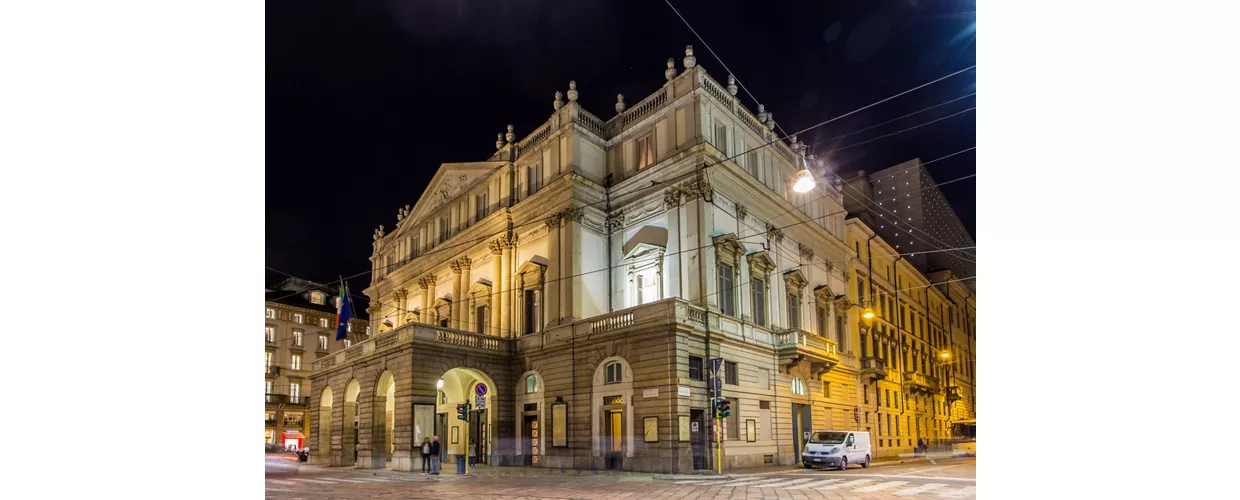 The unmistakable facade of the Teatro alla Scala in Milan by night