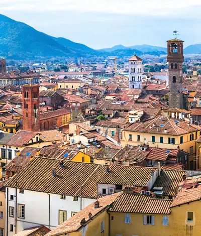 Lucca and the embrace of its mighty walls