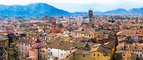 Lucca and the embrace of its mighty walls