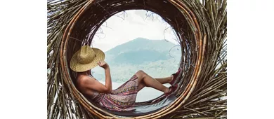 Traveller young woman sitting looking the mountain landscape at world trip