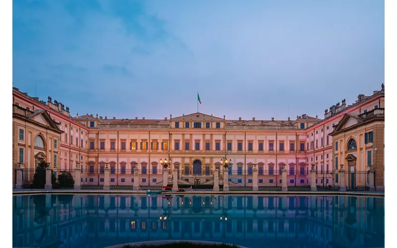 The Royal Villa of Monza, a neoclassical style building illuminated at sunrise